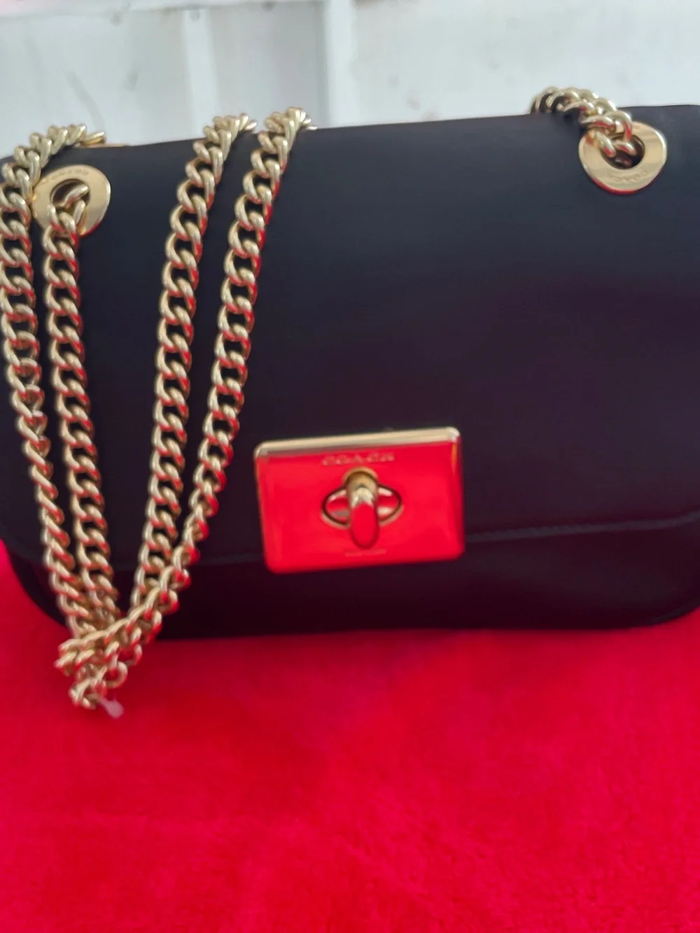 Coach Black Leather Shoulder Bag with Gold Chain Strap and Turnlock